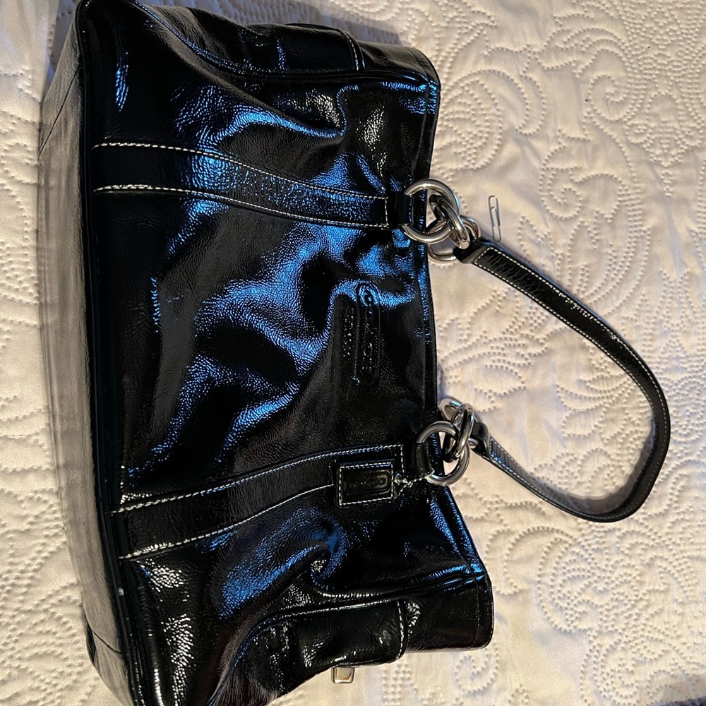 Black and Silver coach bag.